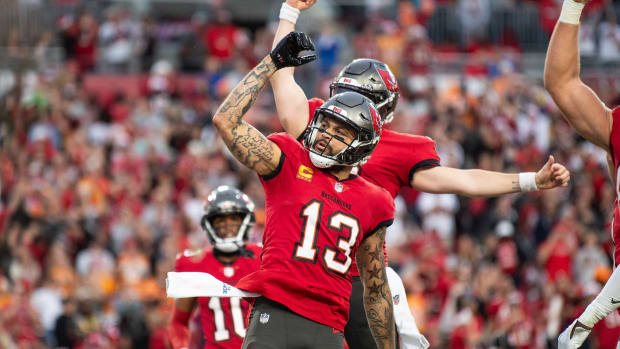 Dec 24, 2023; Tampa, Florida, USA; Tampa Bay Buccaneers wide receiver Mike Evans (13) celebrates the touchdown against the Jacksonville Jaguars in the second quarter at Raymond James Stadium. Mandatory Credit: Jeremy Reper-USA TODAY Sports  